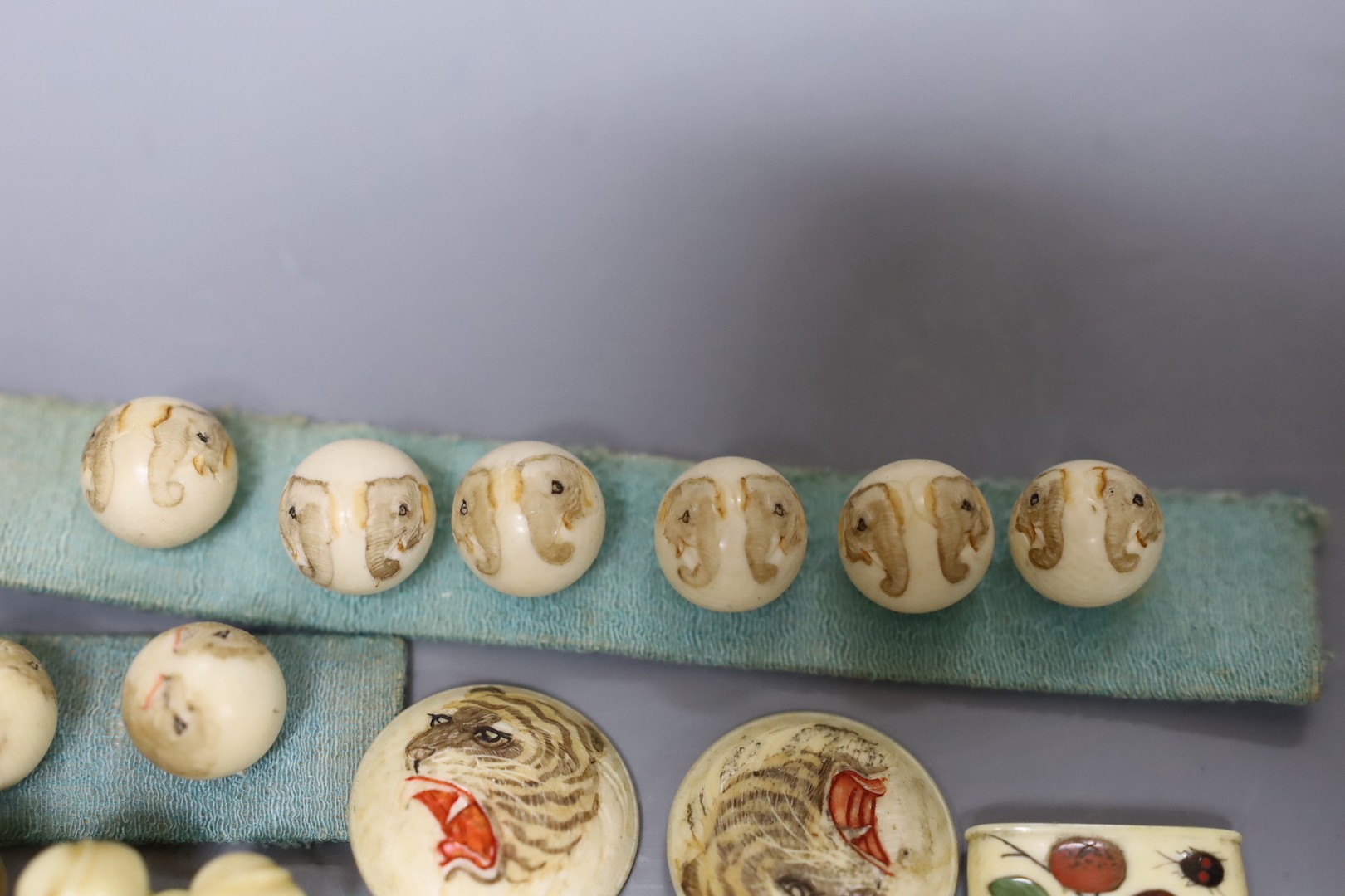 A group of Japanese ivory buttons, early 20th century etc